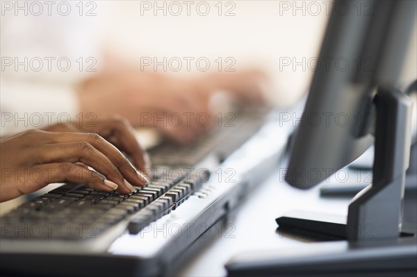 Employees working at computers.