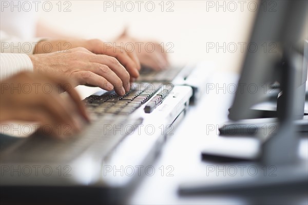 Employees working at computers.