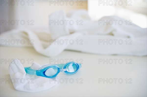 Swim cap and goggles.