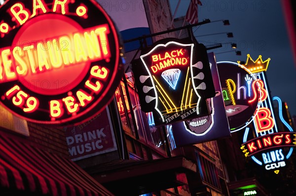 Illuminated bar signs on Beale Street in Memphis.