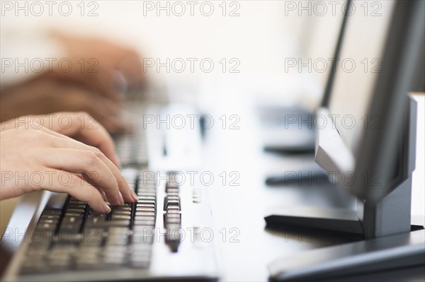 Employees working at computers.