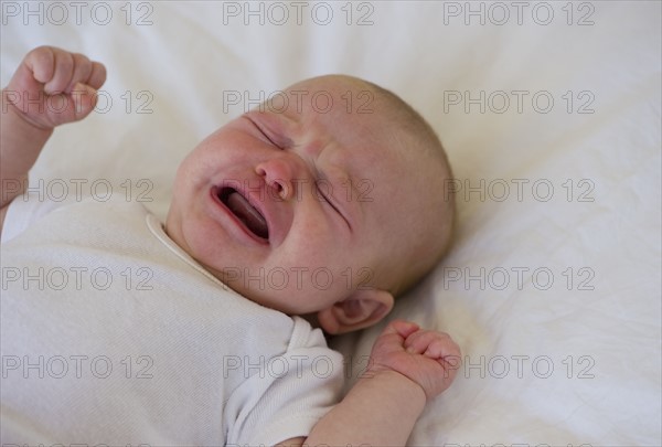 Crying infant. Photo : Chris Grill