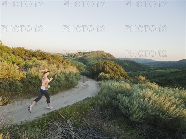 Woman trail running.