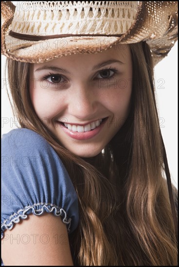 Smiling cowgirl. Photo : Mike Kemp