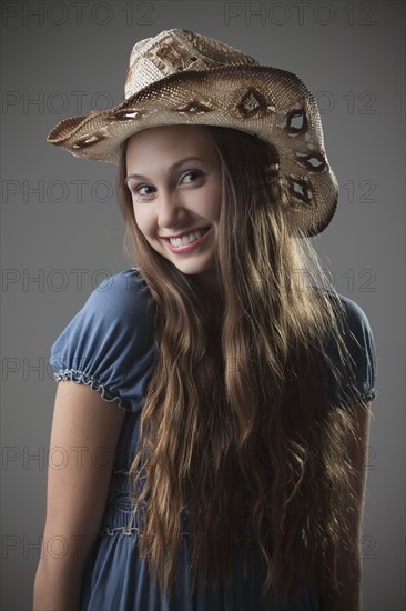 Beautiful long haired cowgirl. Photo : Mike Kemp