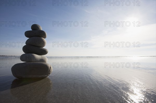 Stack of rocks on the beach. Photo : Chris Hackett