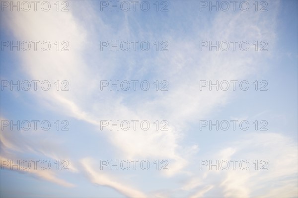 Clouds sunlight and blue sky. Photo : Chris Hackett