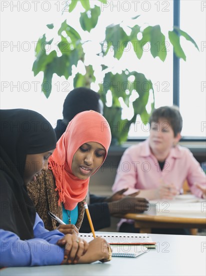 Adults students learning English as a second language.