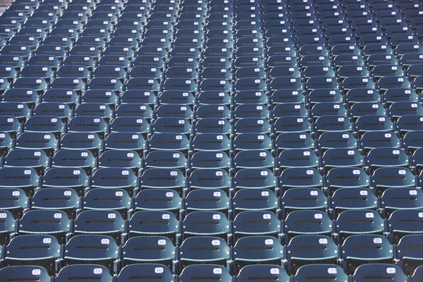 Empty bleacher seats. Photo : fotog