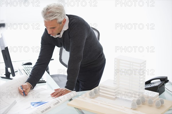 Architect working on house plans.