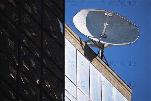 Satellite dish on top of building.