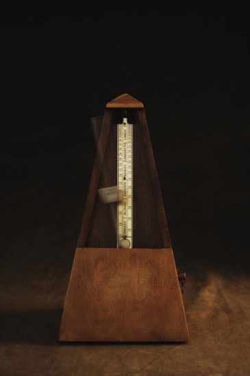 Antique metronome.