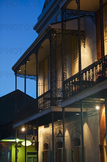 Balconies at night in French Quarter of New Orleans.