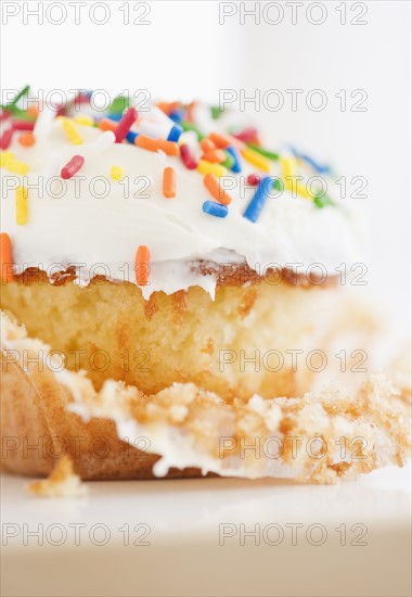 Colorful sprinkles on cupcake. Photo : Jamie Grill