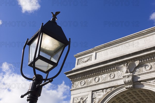 Lamp post in front of Washington Square arch.
