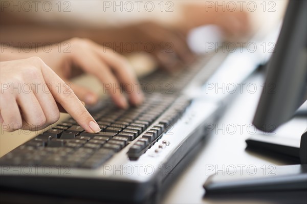 Employees working at computers.