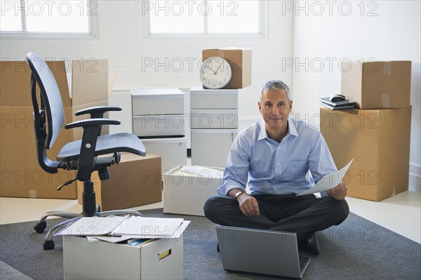 Business entrepreneur working in startup office.