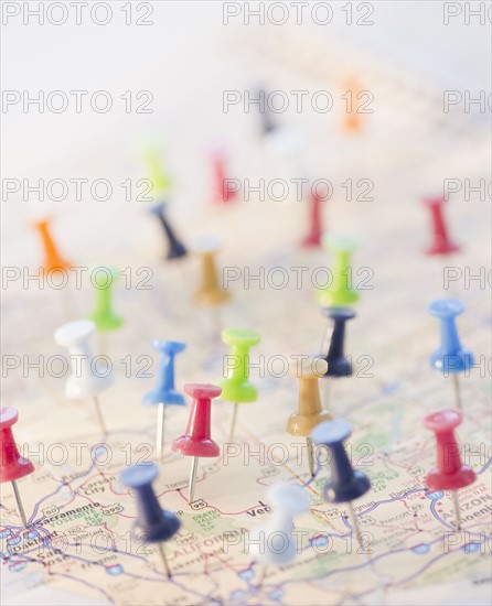 Pushpins in a map. Photo. Jamie Grill