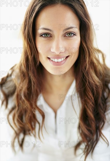 Smiling brunette. Photo. momentimages