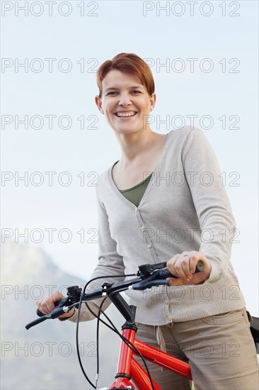 Smiling cyclist. Photo. momentimages