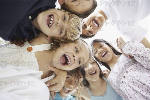 Group of excited young children. Photo. momentimages