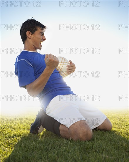 Excited soccer player. Photo : Mike Kemp