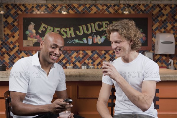Customers in juice bar. Photo. Dan Bannister