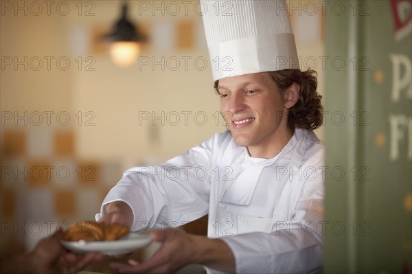 Chef serving pastry. Photo : Dan Bannister