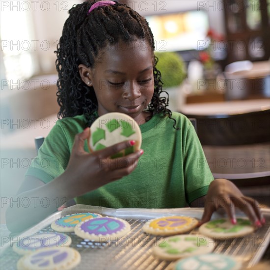 Young girl baking cookies. Photo. Tim Pannell