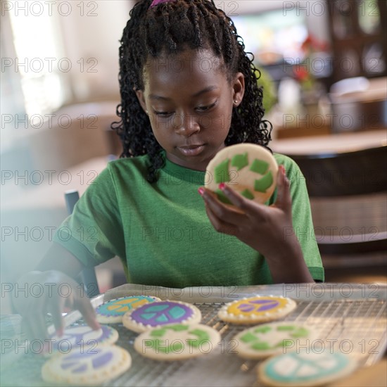 Young girl baking cookies. Photo. Tim Pannell