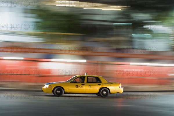 Taxi cab driving at night. Photo. Antonio M. Rosario