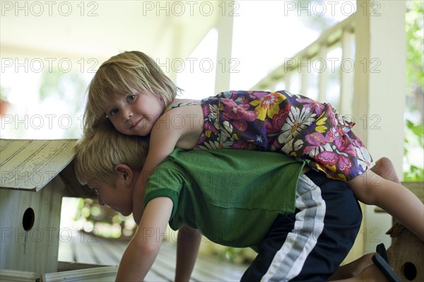 Brother and sister playing together. Photo : Tim Pannell