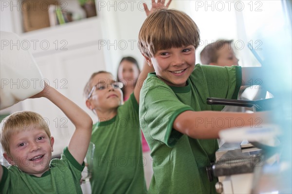 Group of children in kitchen. Photo : Tim Pannell