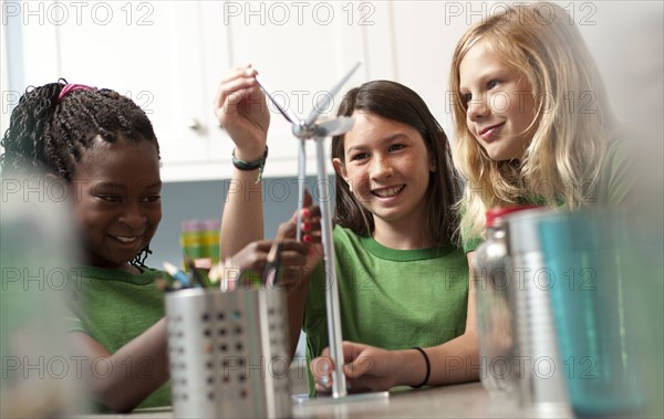 Group of children looking at model windmill. Photo. Tim Pannell