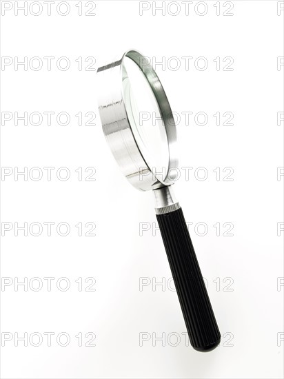 Magnifying glass. Photo. David Arky