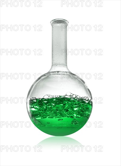 Green liquid in beaker. Photo : David Arky