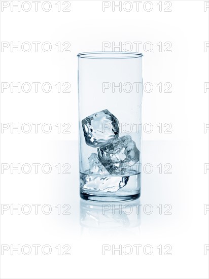 Ice cubes in glass. Photo : David Arky