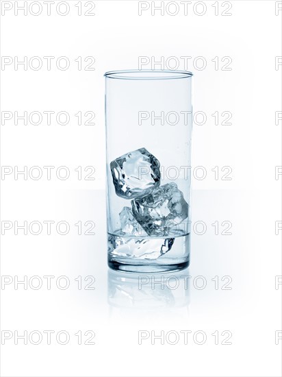 Ice cubes in glass. Photo. David Arky