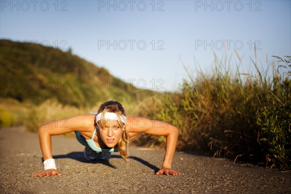 Runner doing push ups. Photo : Take A Pix Media