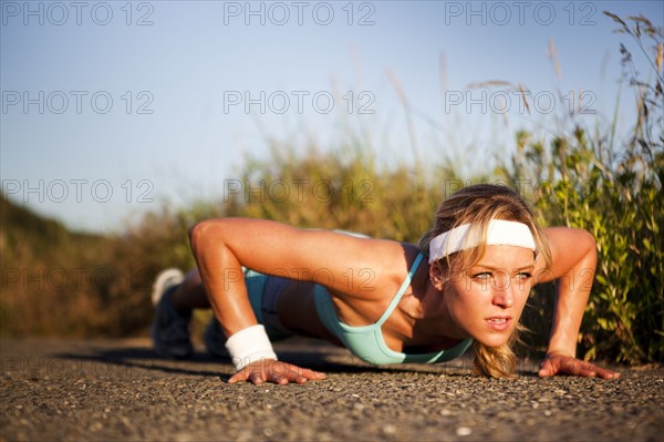 Runner doing push ups. Photo : Take A Pix Media