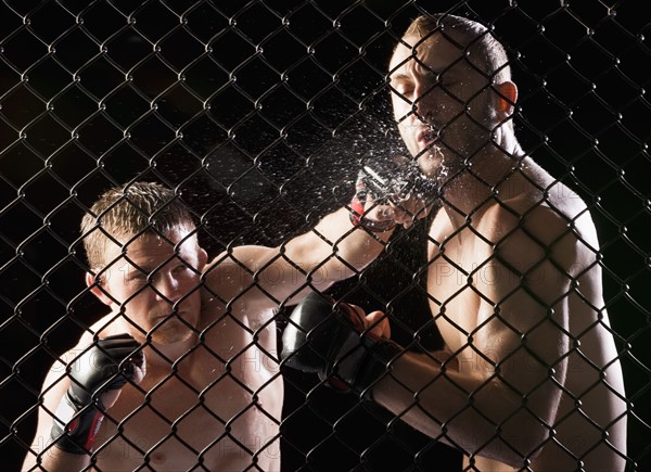 Cage fighters. Photo. Mike Kemp