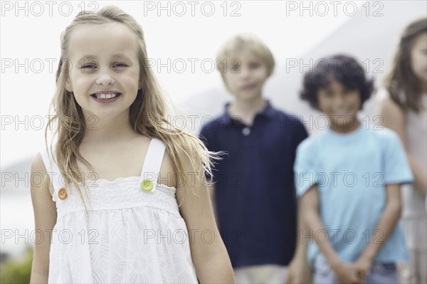 Smiling young girl. Photo. momentimages