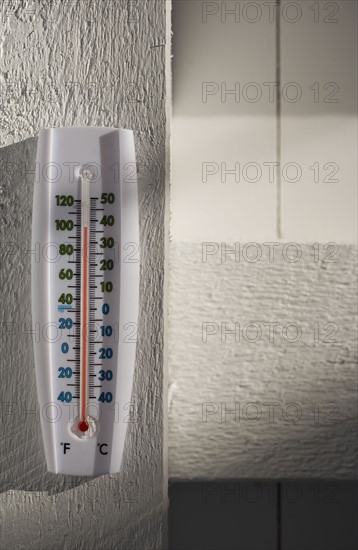 Thermometer on wall. Photo : Chris Hackett