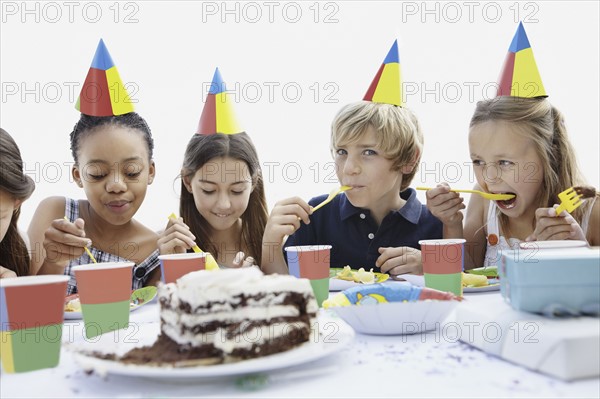 Group of children at a birthday party. Photo. momentimages