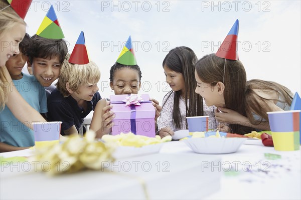 Children at a birthday celebration. Photo. momentimages