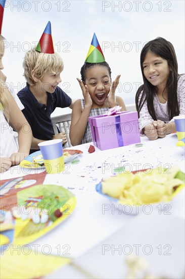 Children at a birthday celebration. Photo. momentimages