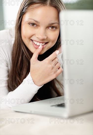 Woman browsing the internet. Photo. momentimages