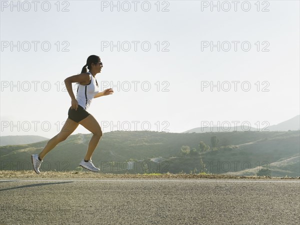 Runner training on the side of the road. Photo. Erik Isakson