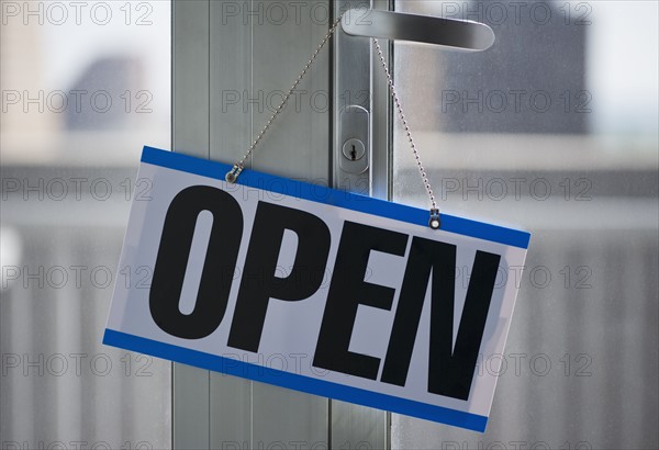 Open sign hanging on door. Photo : Daniel Grill