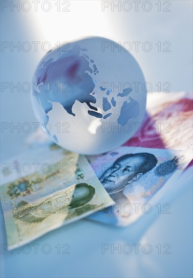 Globe on Chinese currency.